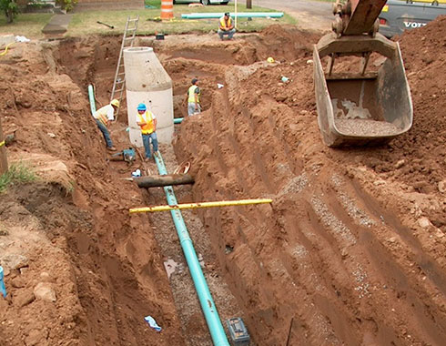 Providing & Laying 300 mm 700 mm dia. Internal and peripheral sewer line.
